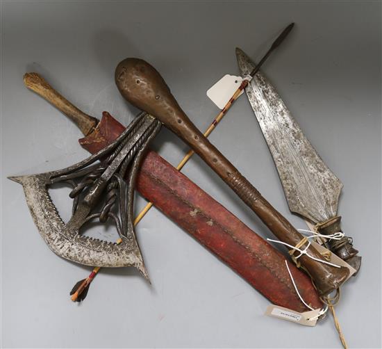 A wood and iron ceremonial axe, possibly Songye, a leaf-shaped tribal dagger and two other items